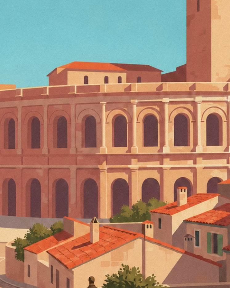 Les arcades des arènes d’Arles derrière les maisons aux toits de tuiles rouges