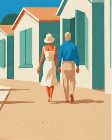 A couple in a white dress and blue shirt in front of the beach huts with green doors