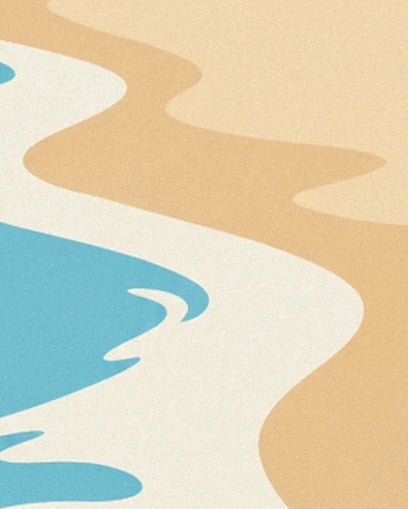 L’écume blanche entre l’eau turquoise et le sable doré de Biscarrosse Plage