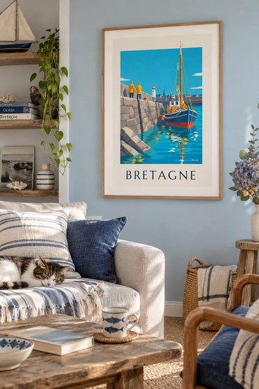 Poster of a Breton fishing boat returning to a granite harbor: framed on the wall