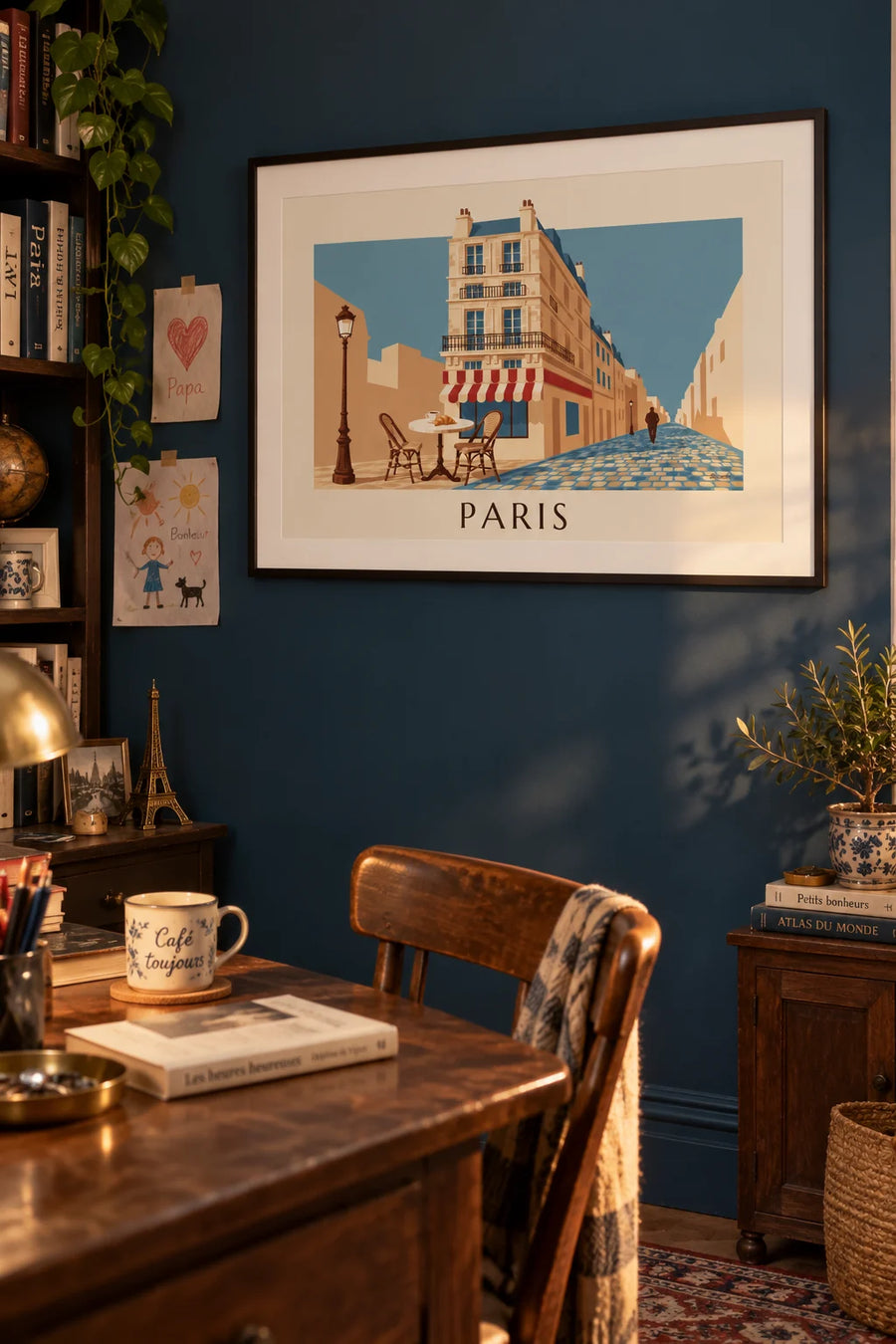 Poster of a coffee and croissant on a Parisian café terrace: framed on the wall