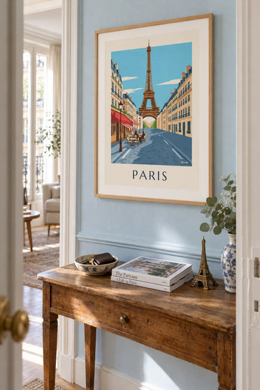Poster of a Parisian café terrace facing the Eiffel Tower: framed on the wall