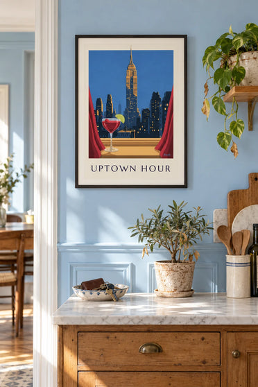 Poster of a red cherry cocktail in front of the Empire State Building: framed on the wall