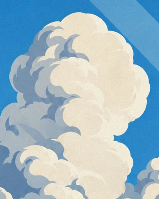 Gros cumulus crème aux ombres bleu-gris, dans un ciel d'un bleu franc