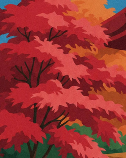The maples’ dark branches beneath red, pink and orange foliage