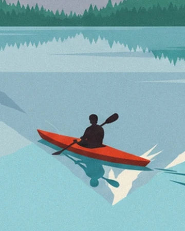 Un kayakiste en silhouette dans son kayak rouge sur le lac aux reflets turquoise