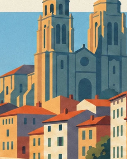 Les 2 tours de l’église au-dessus des façades claires et des toits orangés de Mâcon