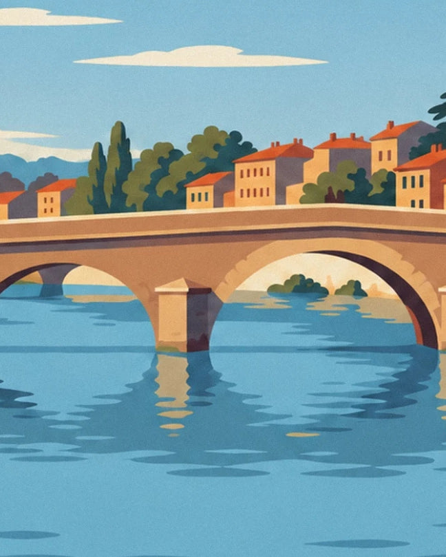 Les arches du pont Saint-Laurent sur l’eau bleue, devant les maisons aux toits rouges