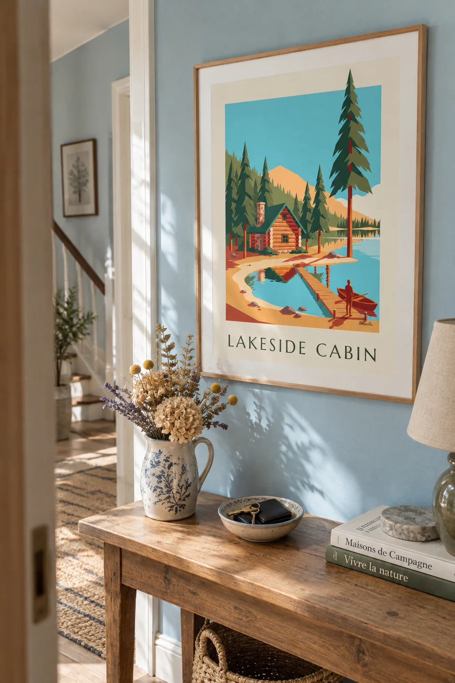 Poster of a log cabin on the shore of a mountain lake: framed on a wall