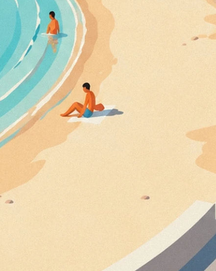 A swimmer sitting on the golden sand and another in the turquoise waves