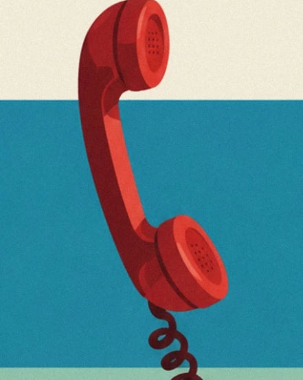 The red handset and its coiled cord against a turquoise blue background