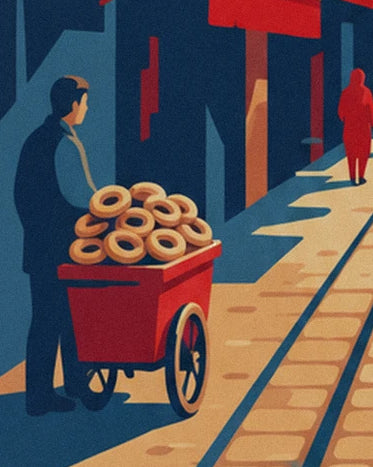 The ring-shaped bread seller and his red cart with a large wheel