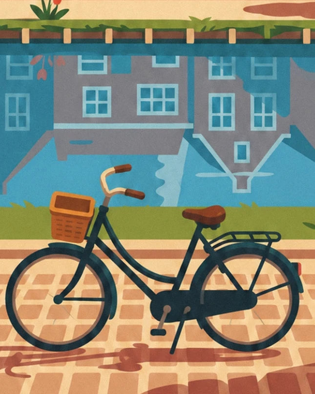 The black Dutch bicycle with its brown basket, beside the canal and cobblestones
