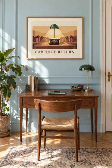 Poster of a typewriter under a green desk lamp: framed on the wall