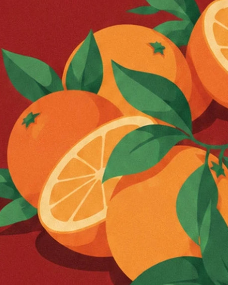 Whole and cut oranges among green leaves against a deep red background