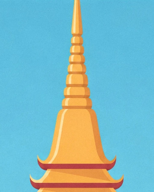 The golden spire of a pagoda and its red-edged roofs against a blue sky