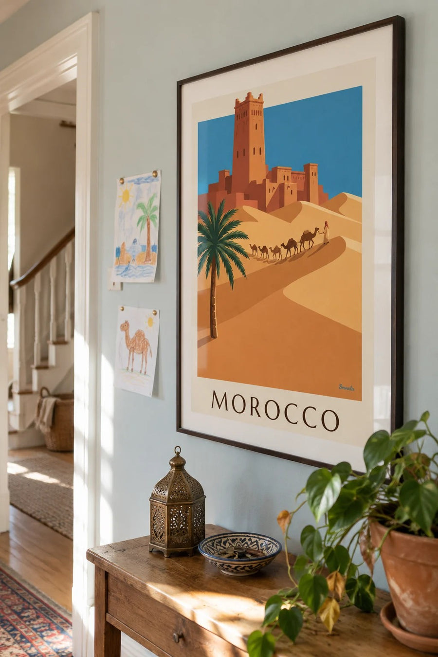 Moroccan desert kasbah and camel caravan poster: framed on the wall