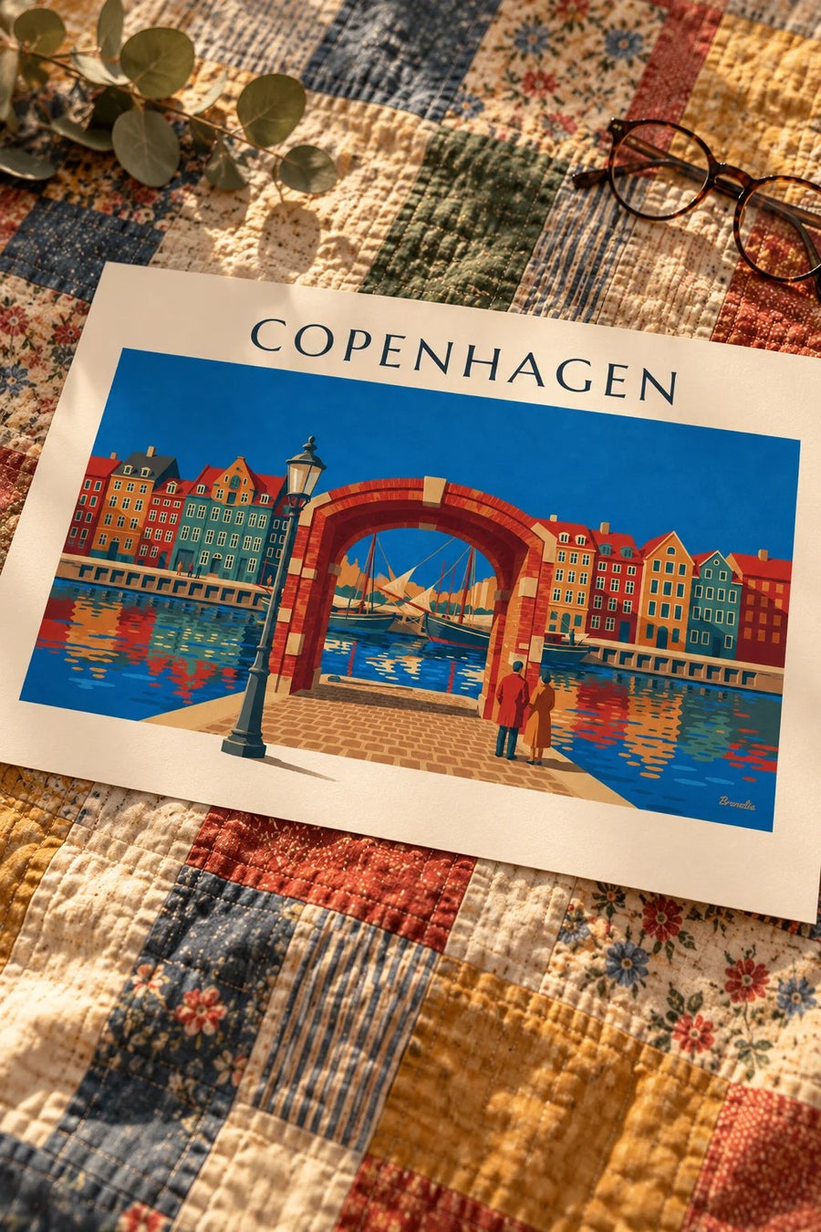 Copenhagen Nyhavn colorful houses and old sailboats poster: laid flat on a table