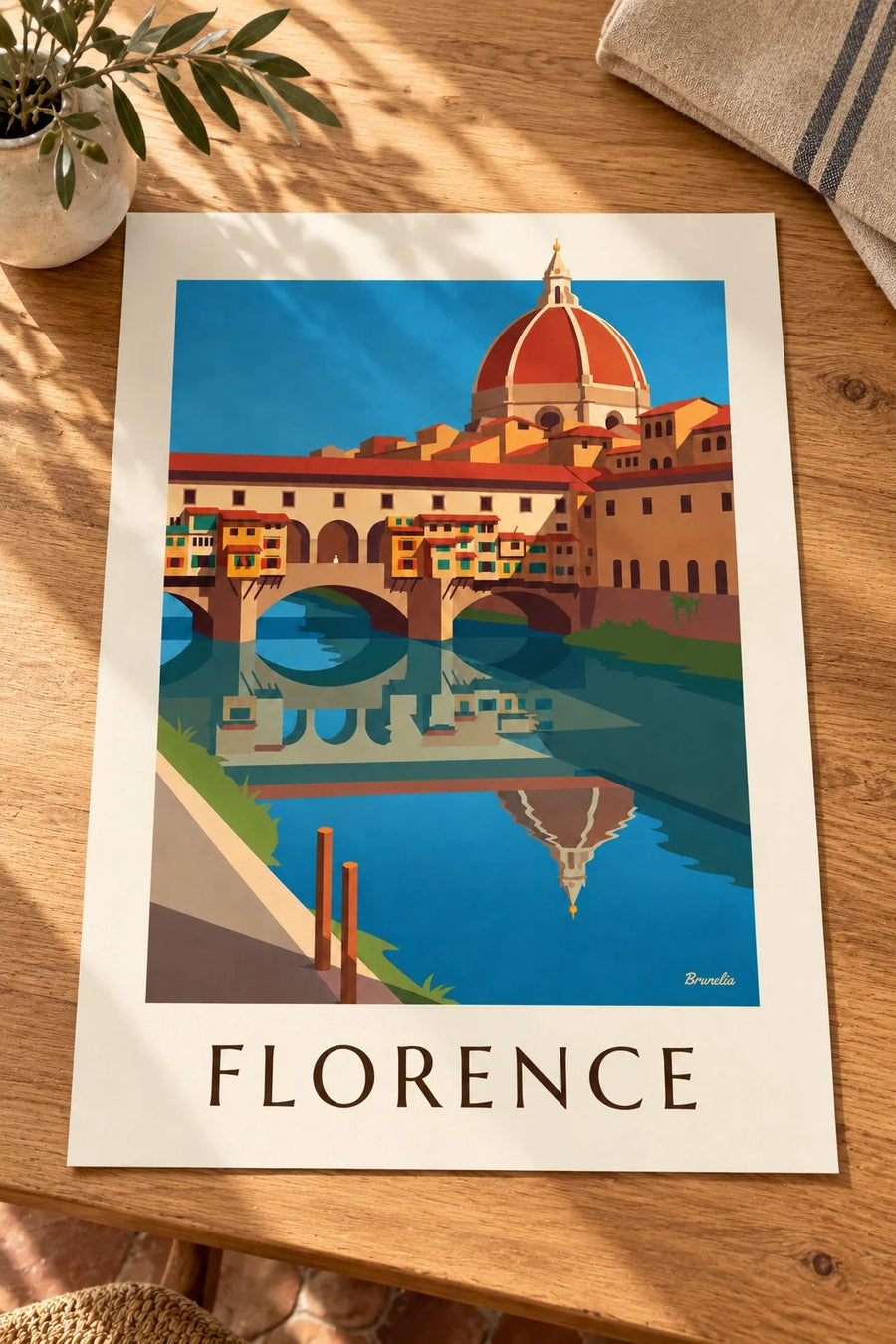 Ponte Vecchio and the Arno in Florence poster: set on a table