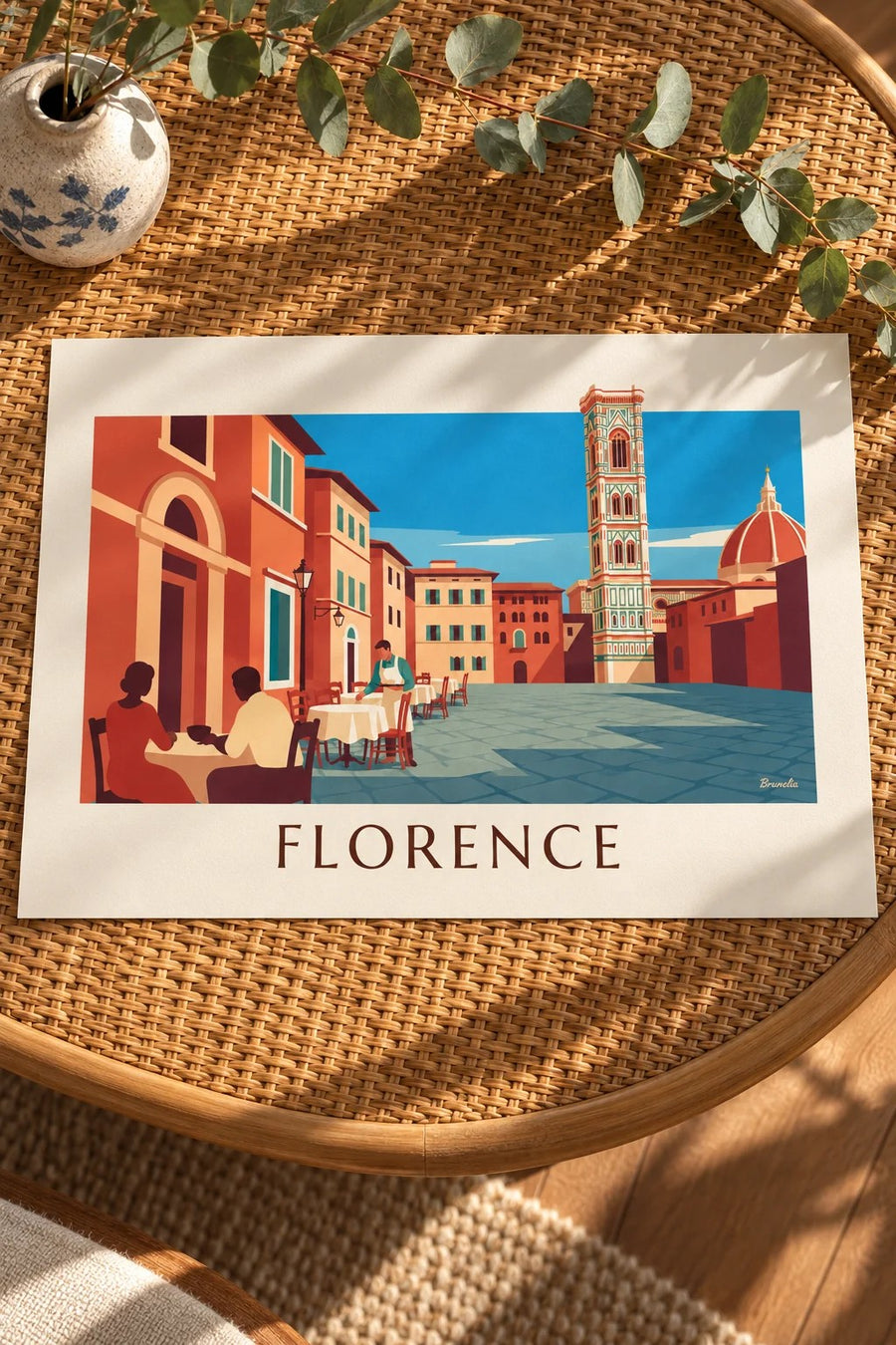 Café terrace facing the Duomo of Florence poster: resting on a table