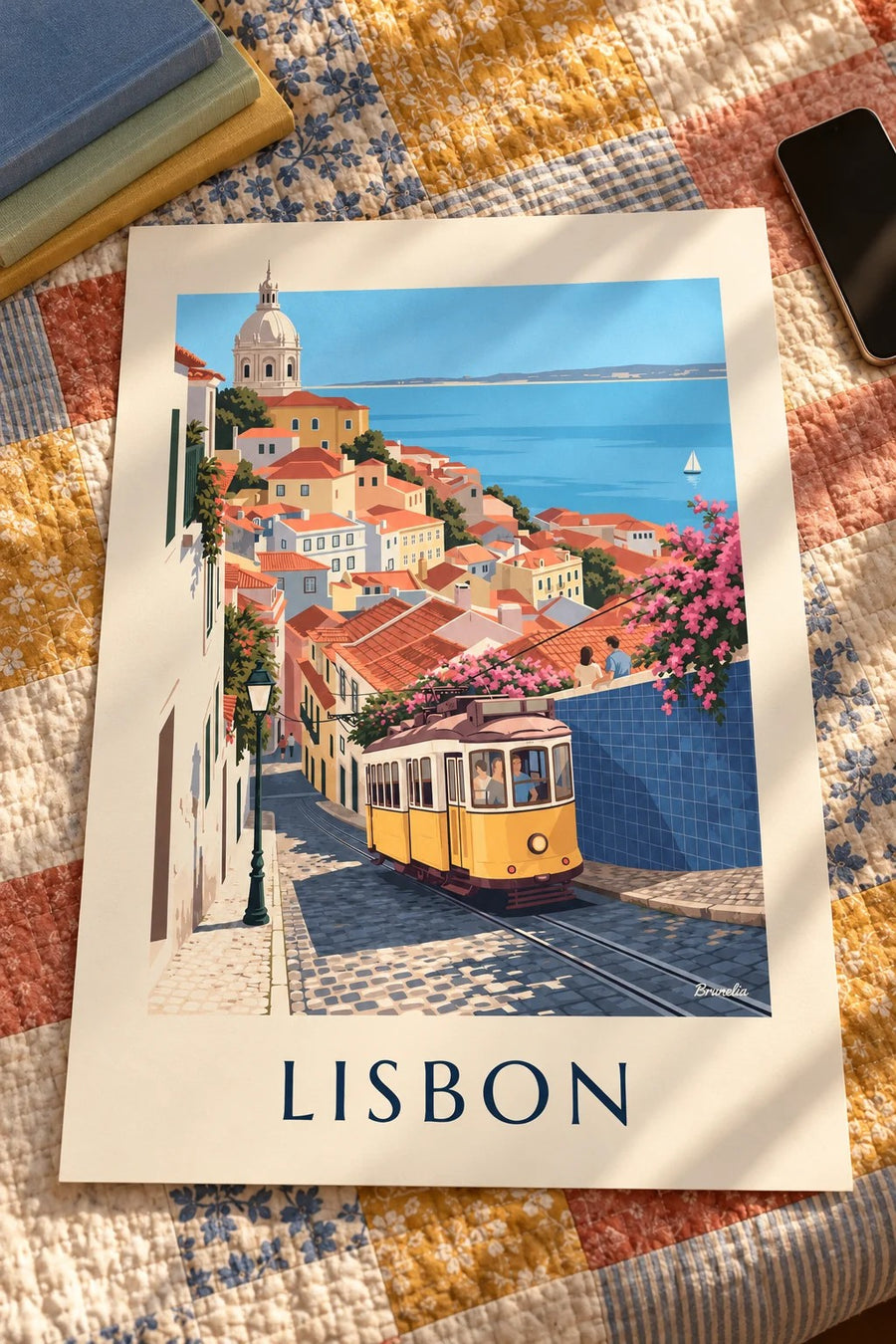 Lisbon yellow tram and Tagus view poster: laid flat on a table