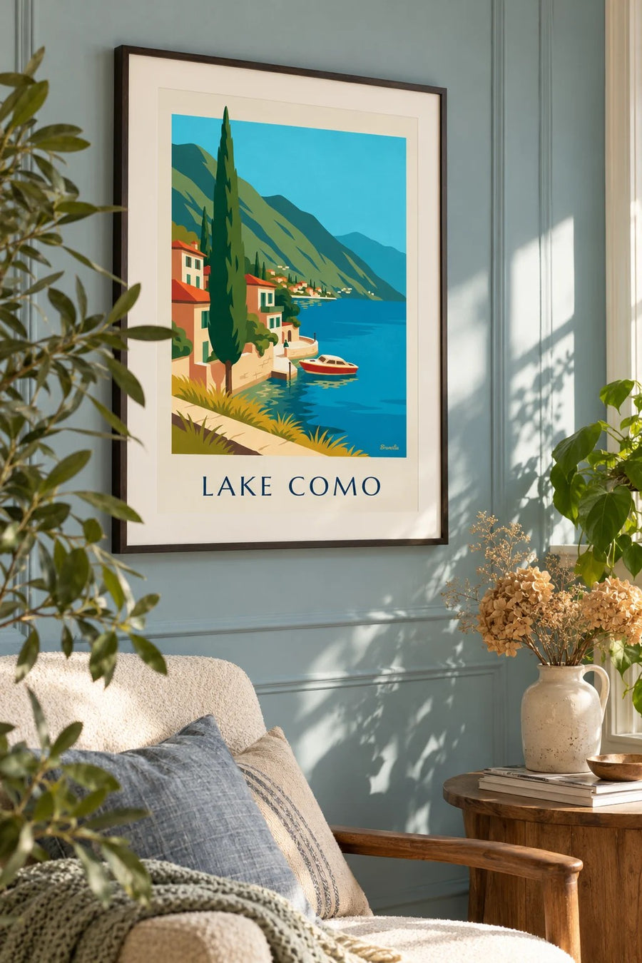 Lake Como shore and wooden boat poster: framed on the wall
