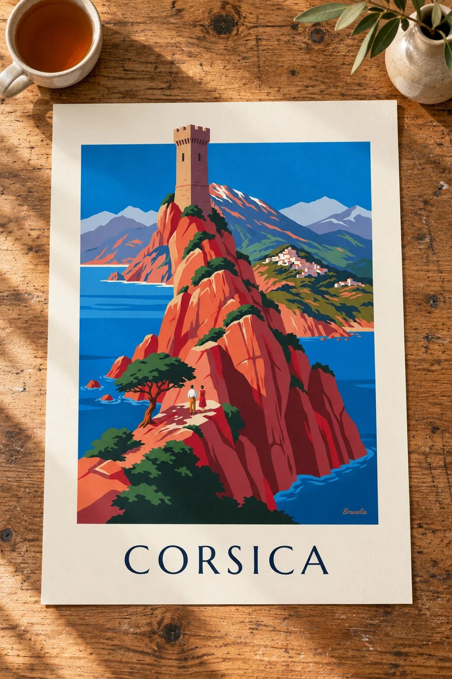 Wild Corsican coast with red cliffs and Monte Cinto poster: laid flat on a table
