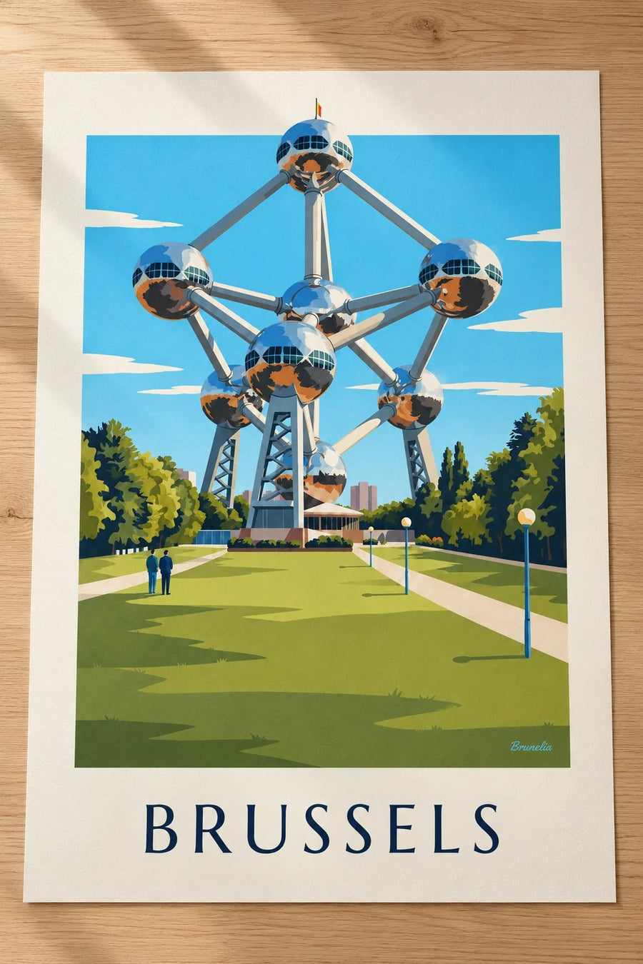 Brussels Atomium and park lawns poster: placed on a table