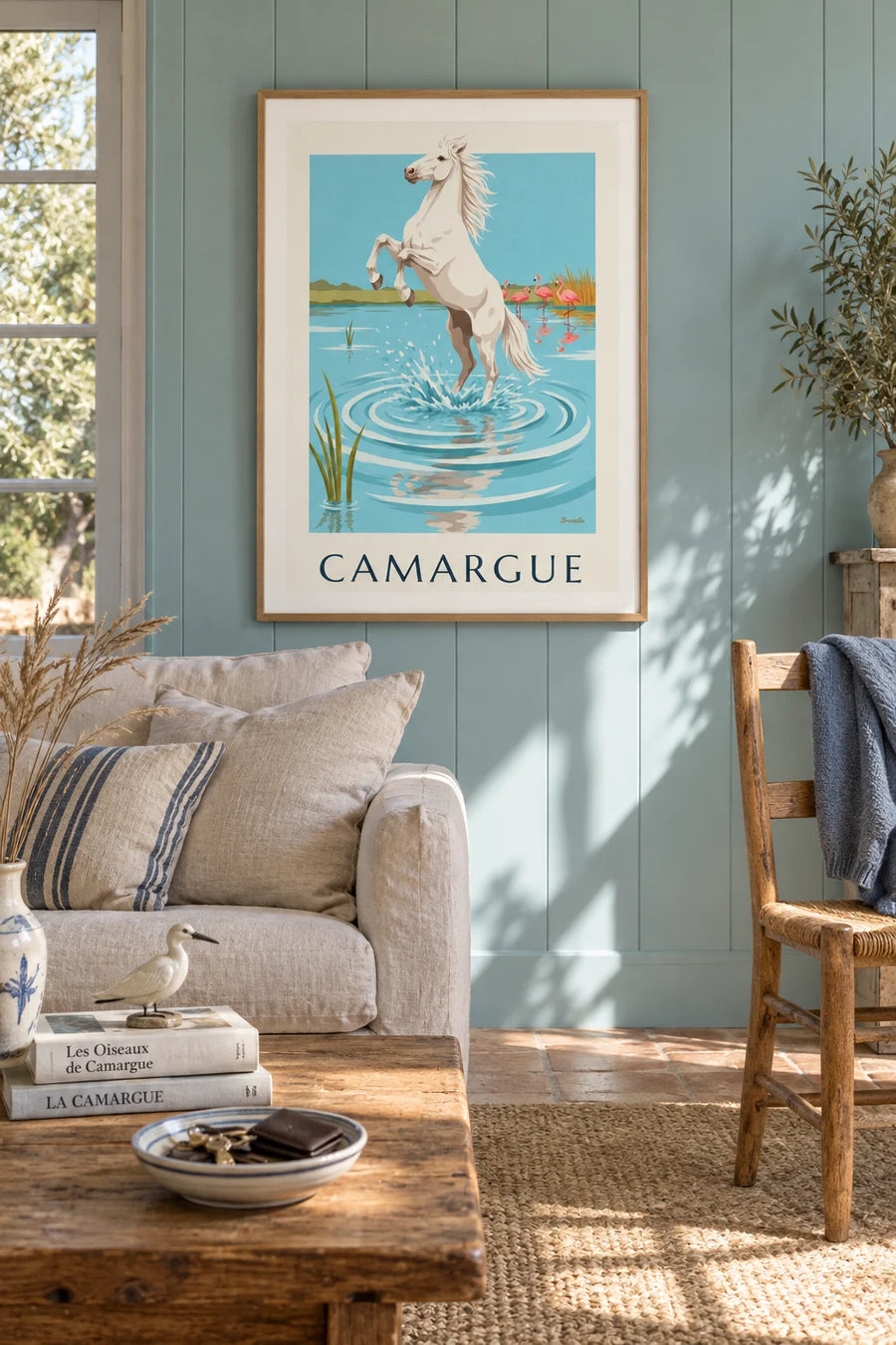 Poster of a white horse galloping through water in the Camargue: framed on the wall
