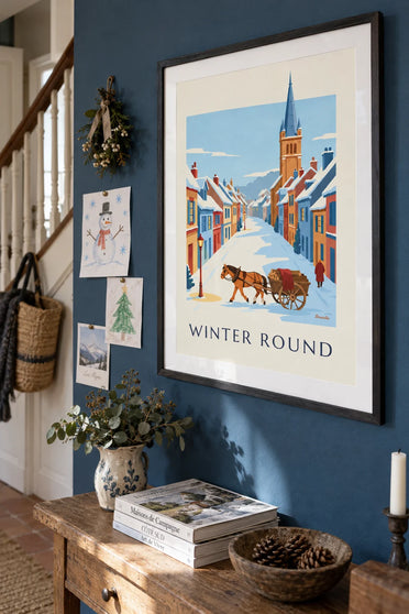 Poster of a horse and cart in a snowy village: framed on the wall