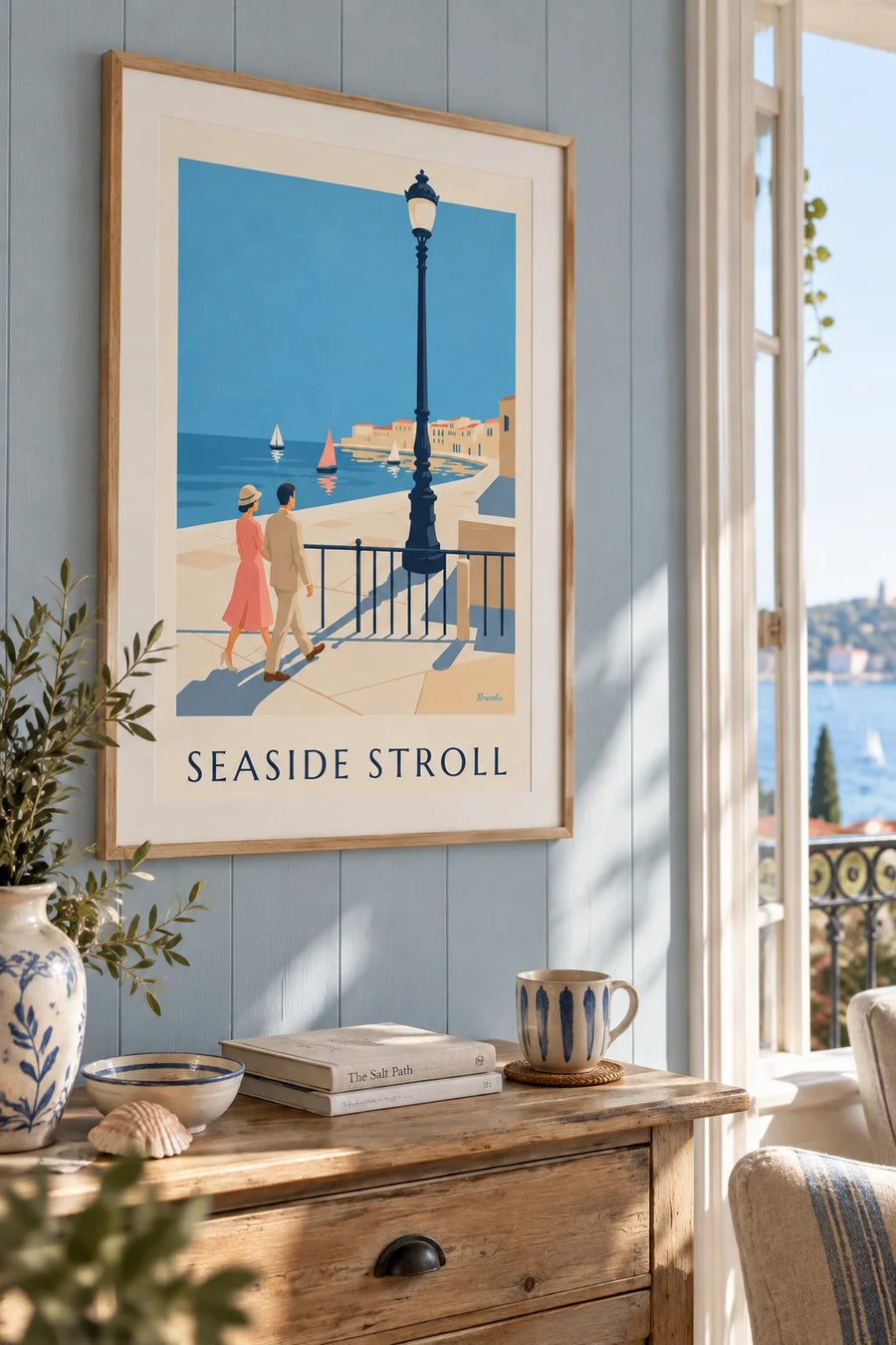 Poster of an elegant couple strolling by the sea: framed on the wall