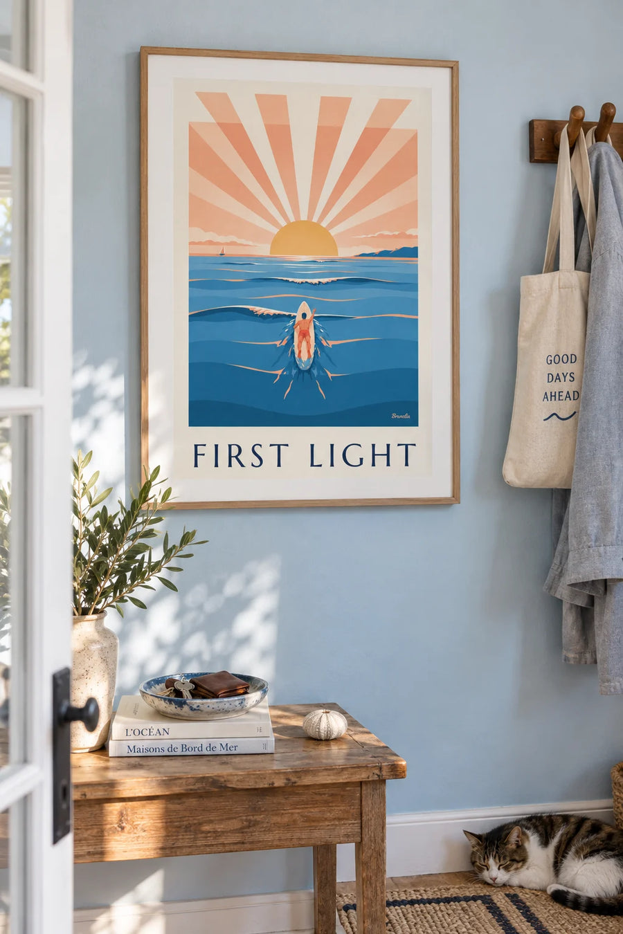 Surfer paddling out at sunrise poster: framed on the wall