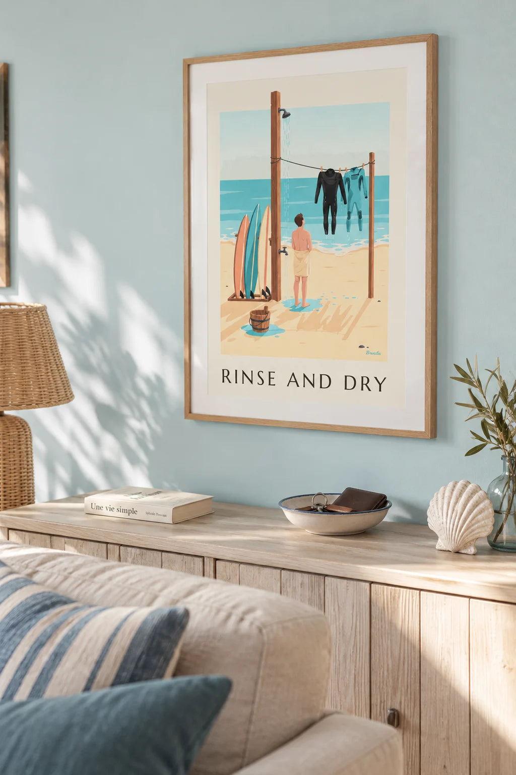 Beach shower and drying wetsuits poster on the wall