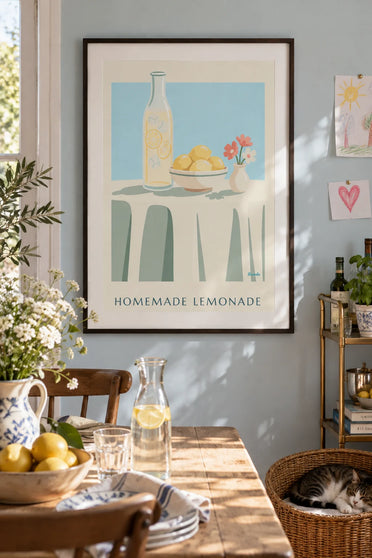 Poster of a carafe of homemade lemonade and a bowl of lemons: framed on the wall